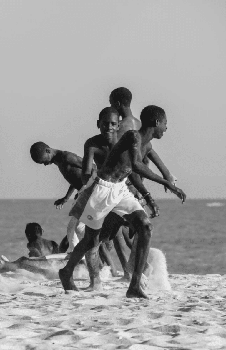 Black and white photograph of young Senegalese men; "Free Senegal" by France Francois