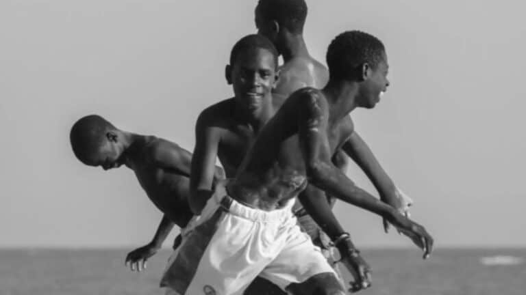 Black and white photograph of young Senegalese men; "Free Senegal" by France Francois